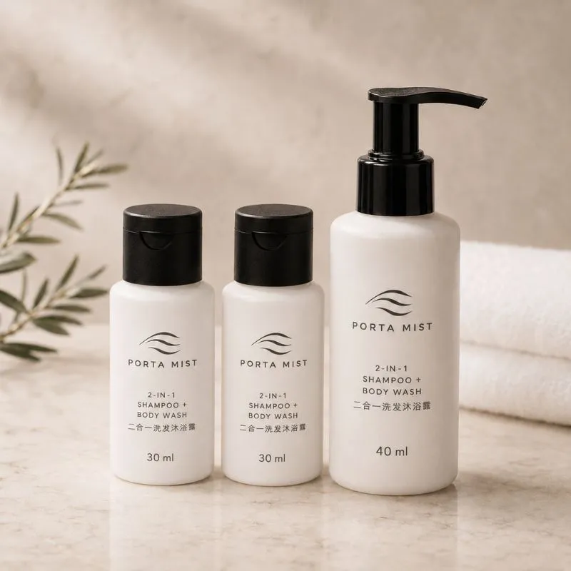 Hotel 2-in-1 shampoo and body wash by UMYAN in 30ml and 40ml bottles on marble — combo amenities for compact room sets